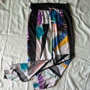 EUC Womens BeBe colorful bright floral long pants size medium